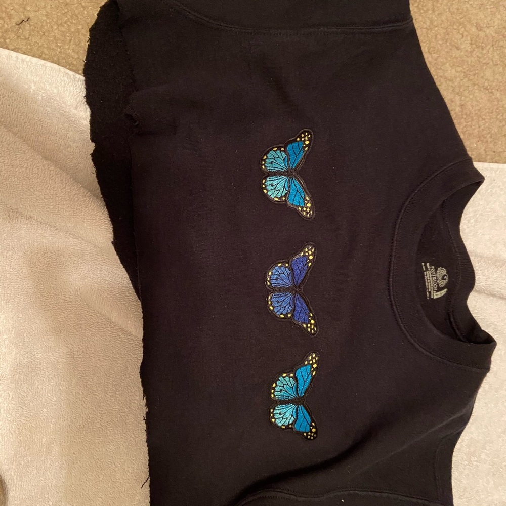 cropped black sweatshirt with butterfly patches